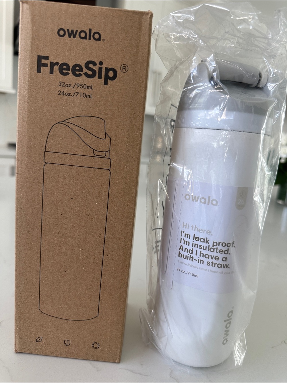Owala FreeSip White Insulated Water Bottle with Built-In Straw